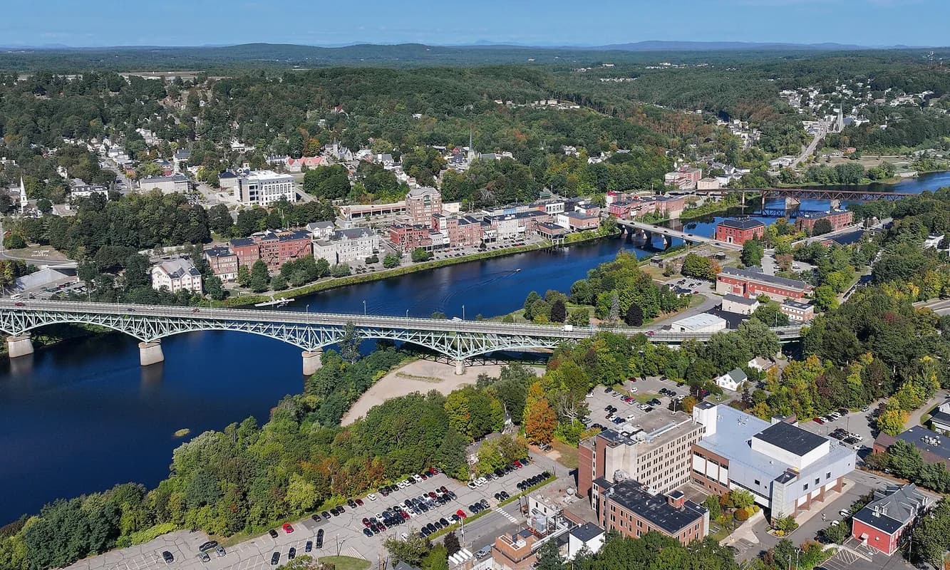 Aerial of downtown Augusta along the Kennebec River in Augusta, Maine