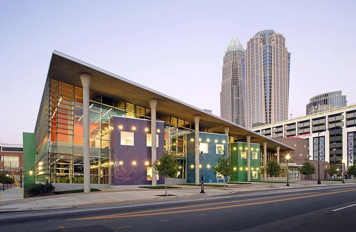 ImaginOn with uptown skyline at dusk in Charlotte, North Carolina
