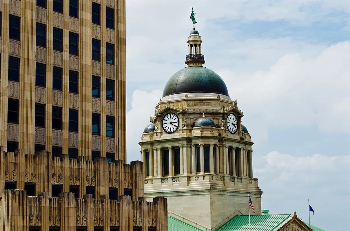 Allen County Courthouse dome beside downtown tower in Fort Wayne, Indiana
