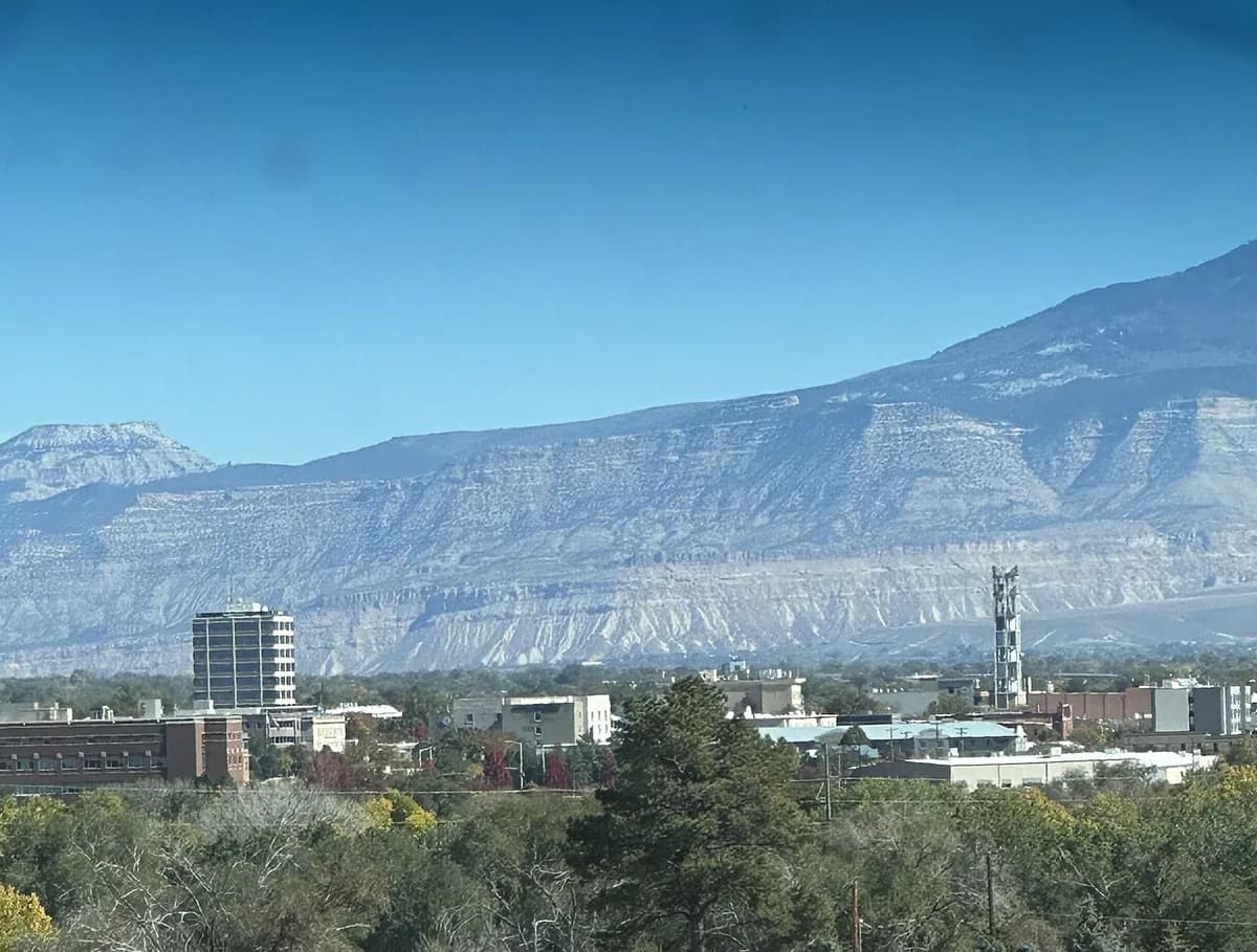 Downtown buildings with Grand Mesa backdrop in Grand Junction, Colorado