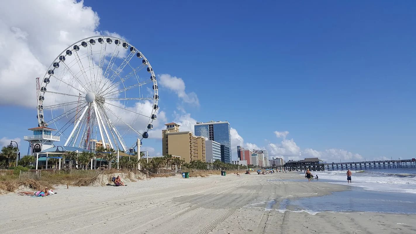 Beach with SkyWheel and hotels in Myrtle Beach, South Carolina