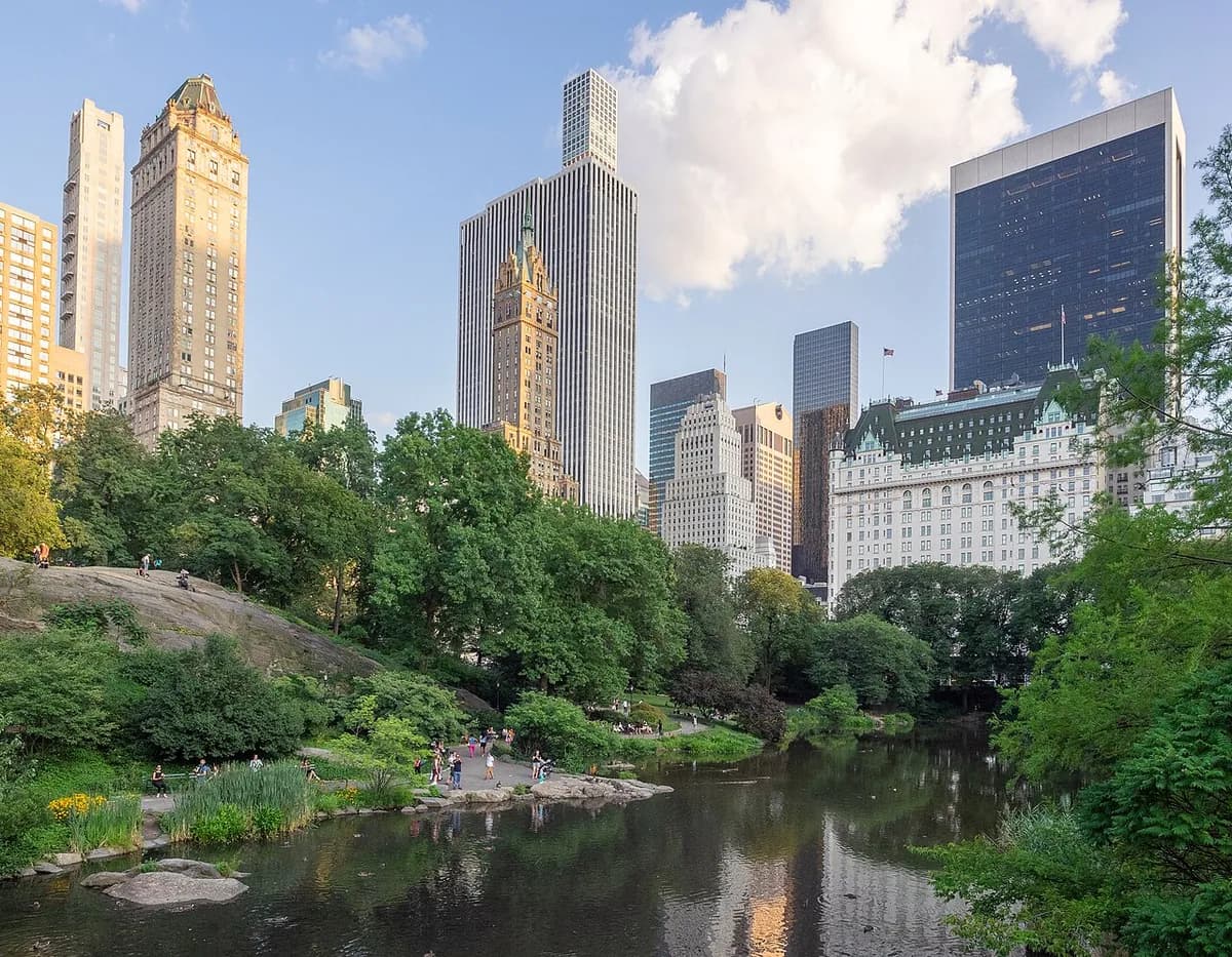 Central Park pond with Midtown skyline in New York City, New York