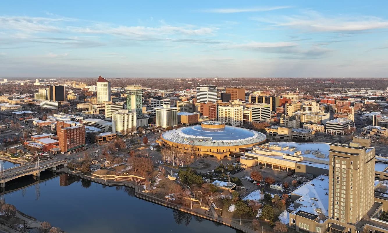 Downtown skyline with Century II and the Arkansas River in Wichita, Kansas